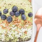 Avocado Green Smoothie Bowl - Creamy Green Smoothie Bowl Topped With Blueberries Sunflower Seeds Chia Seeds Coconut Flakes And Hemp Seeds
