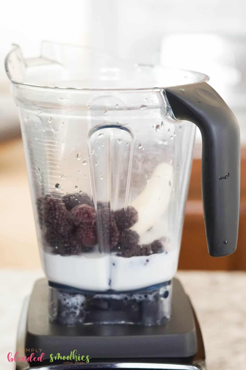 Blackberry Smoothie Ingredients In A Vitamix Blender