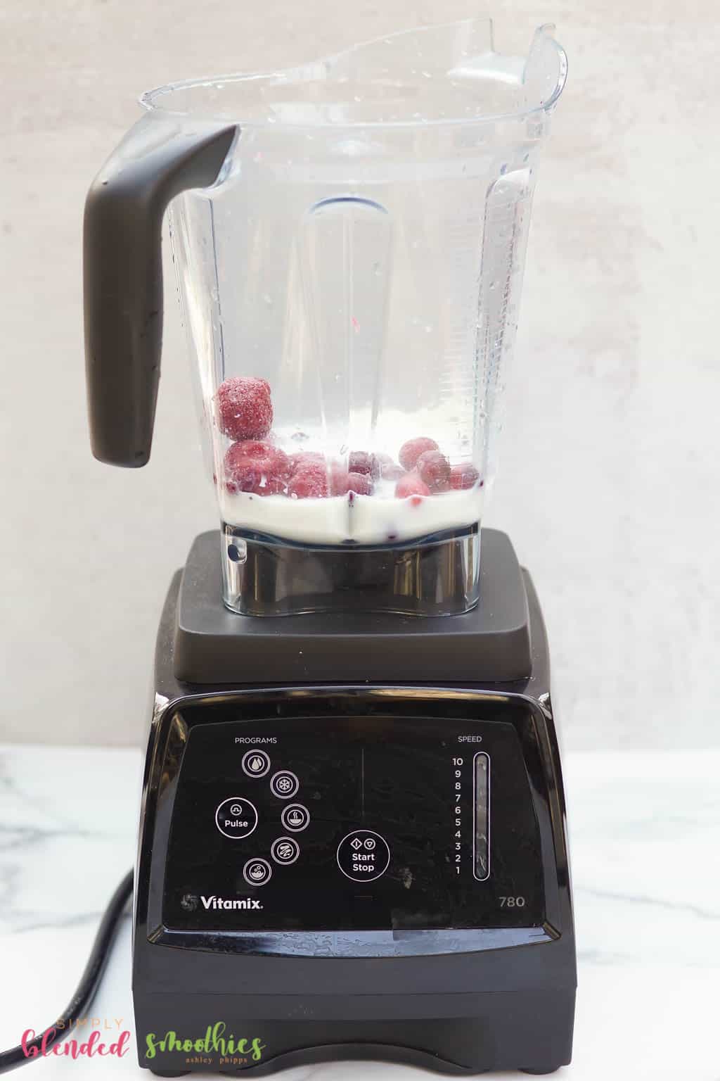 All Ingredients For Cranberry Truffle Smoothie Recipe In A Blender