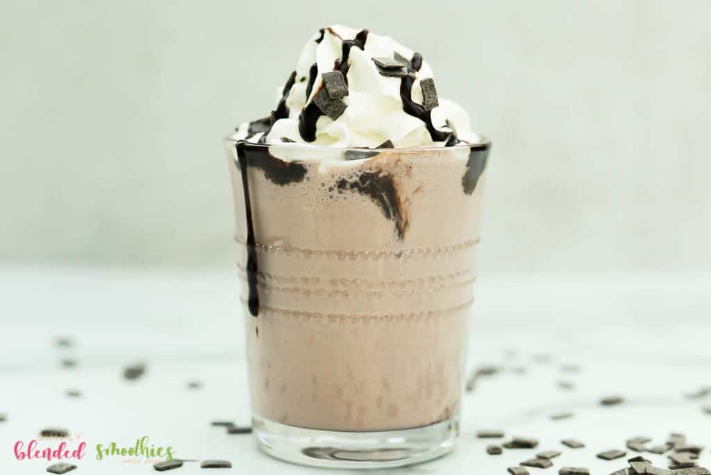 Easy Frozen Hot Chocolate In A Glass Cup With Whipped Cream And Chocolate Syrup