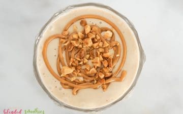 Peanut Butter Banana Smoothie with peanut butter swirl and chopped peanuts