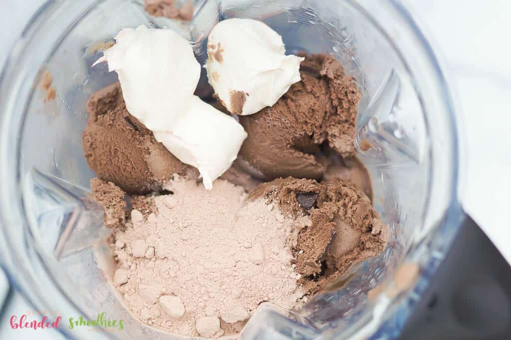 Ingredients For Red Velvet Shake In A Blender From The Top Looking Down