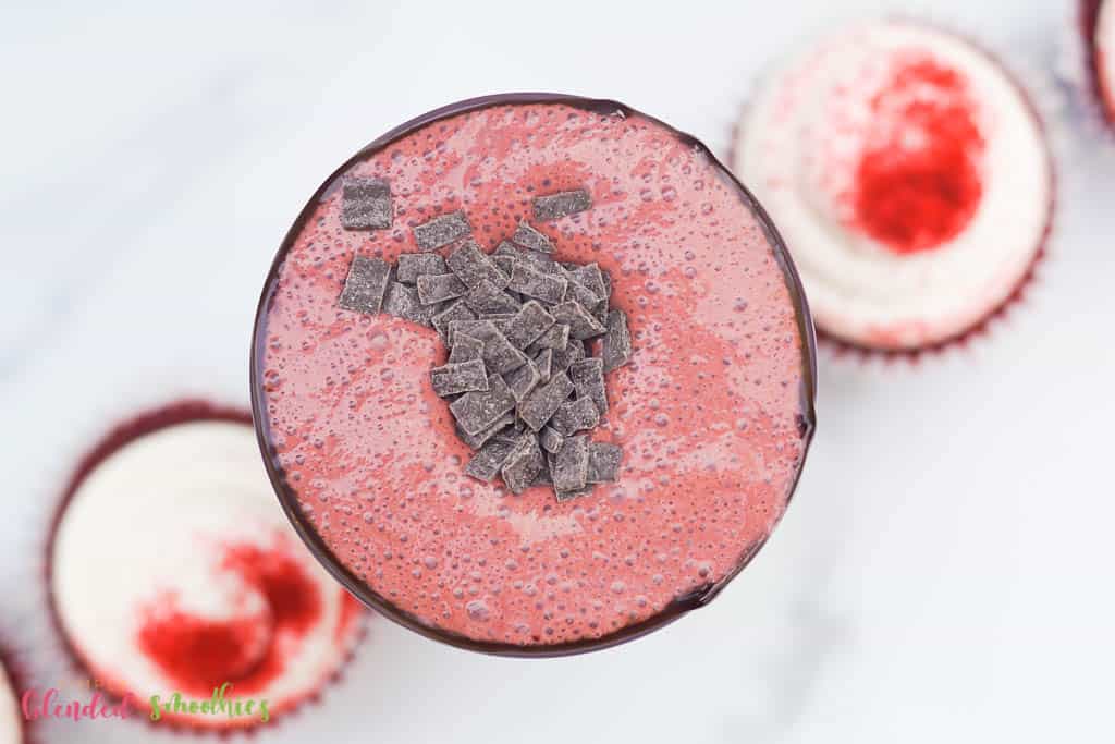 Red Velvet Milkshake With Chocolate Flakes - Image Taken From The Top Down