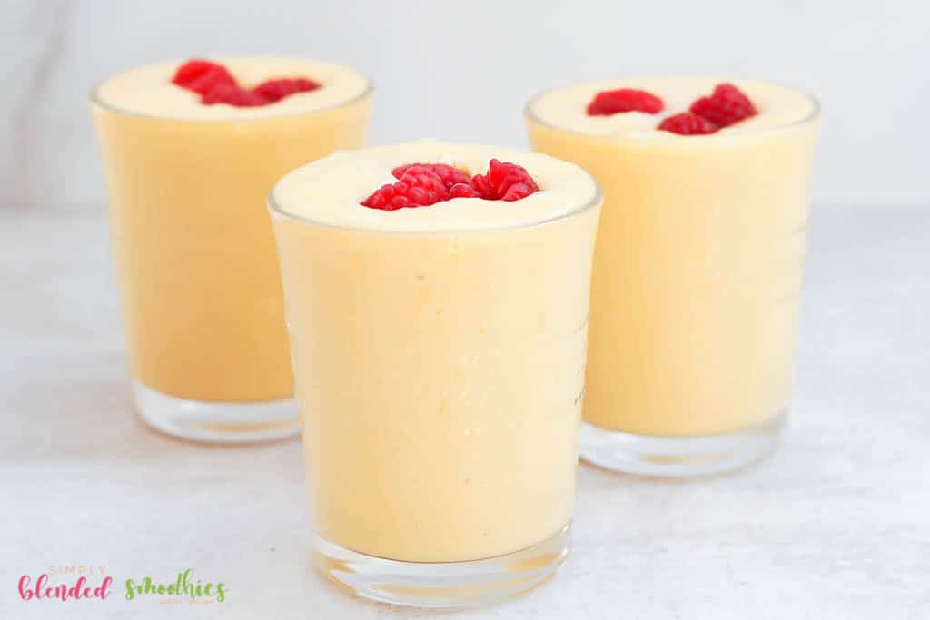 Three Smoothies Made With Bananas And Peaches