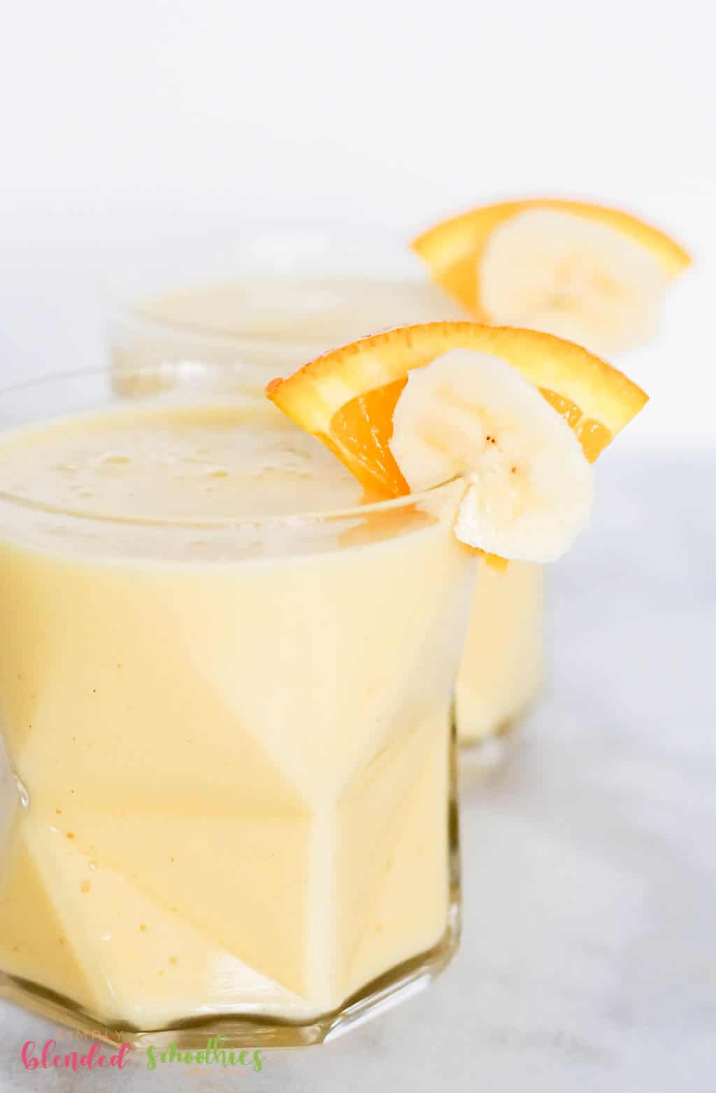 Orange Banana Smoothie Recipe With Oranges And Bananas As Garnish