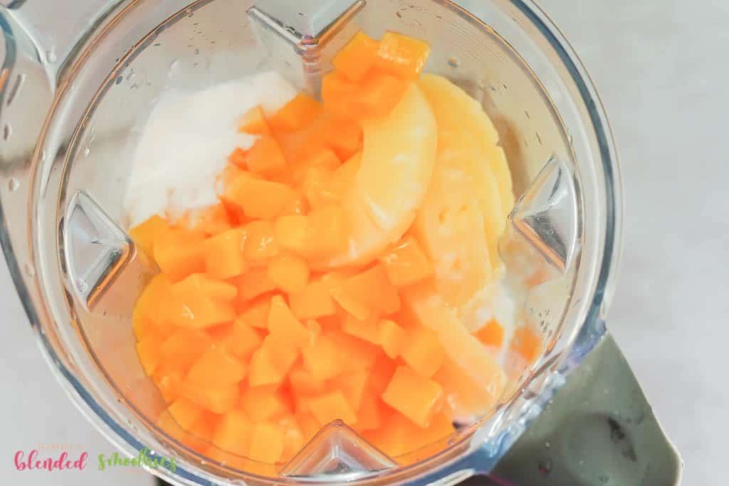 Mangos Pineapple Ice Cream In A Blender Looking From The Top Down